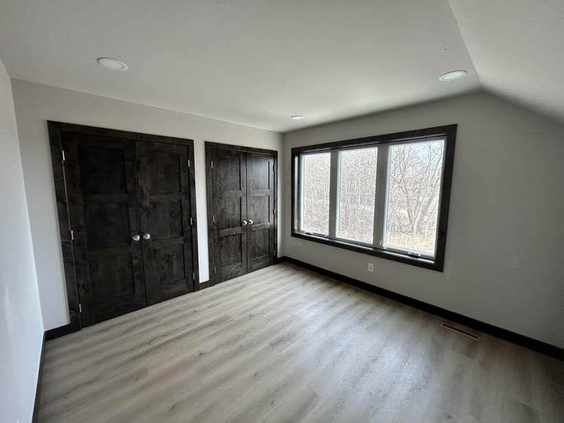 Finished bedroom in a bonus room above the garage in St. Cloud, MN