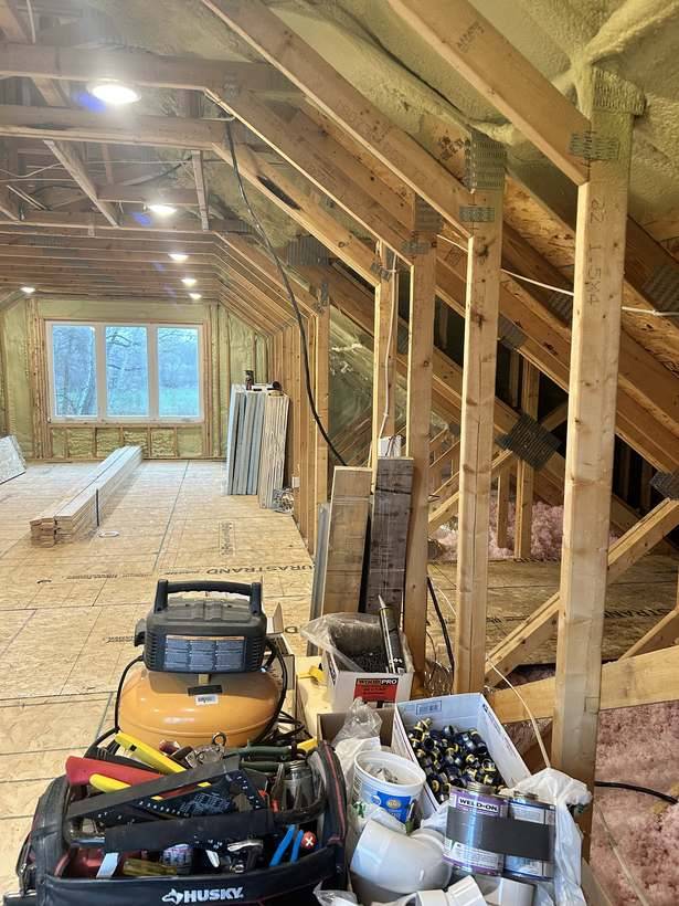 The empty framed space above the garage in St. Cloud, MN before the bonus room project