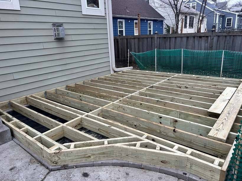 Framing the new deck with its angled corner near the sidewalk