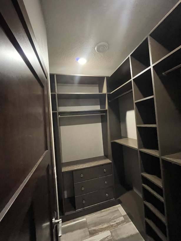 The custom built in closet organizer